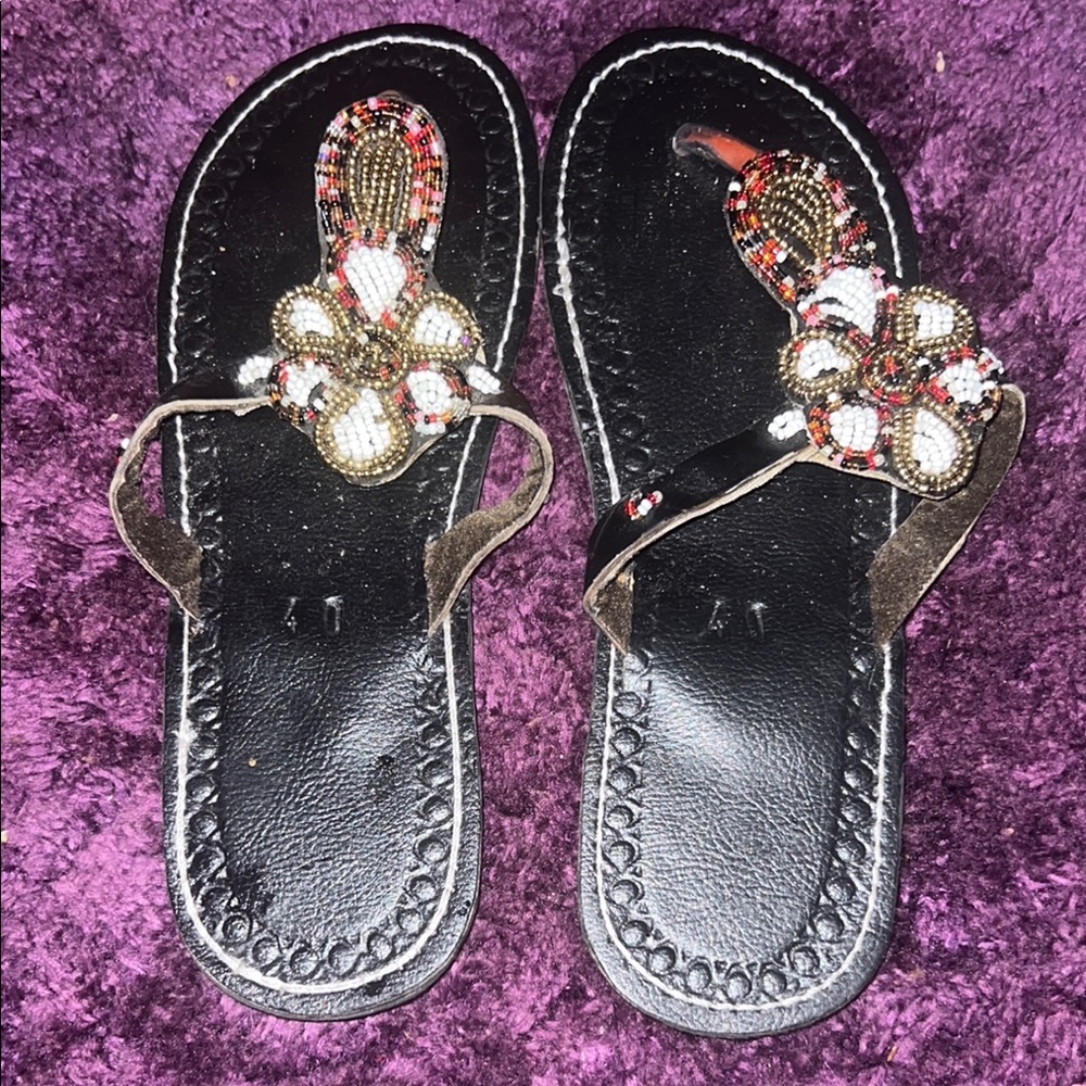 Elegant Black Sandals with Ornate Embellishments